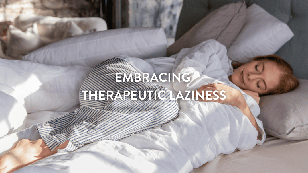 Person sleeping in bed during the daytime surrounded by pillows