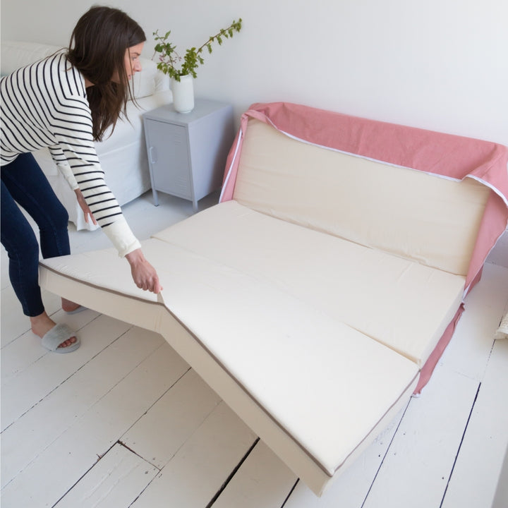 Linen Fold Out Bed / Footstool Putnams blue guest bed