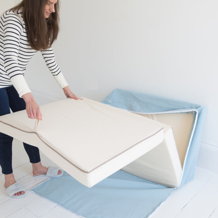 Linen Fold Out Bed / Footstool Putnams blue guest bed