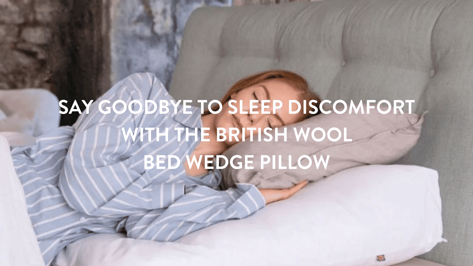 Person lying in bed wearing striped pyjamas using a Putnams British Wool Bed Wedge Pillow