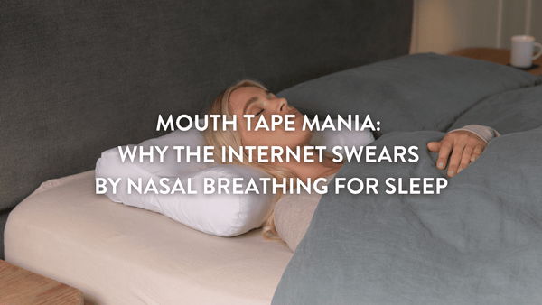 person sleeping on a double bed on a Putnams contour pillow 