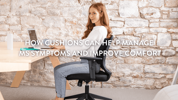 Person sitting at office desk on office chair with Putnams MS relieving cushion