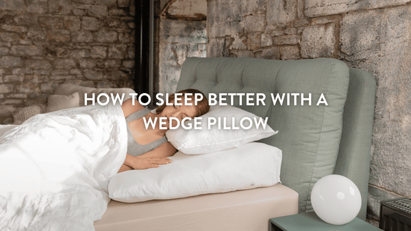 person lying on a Putnams bed wedge pillow 