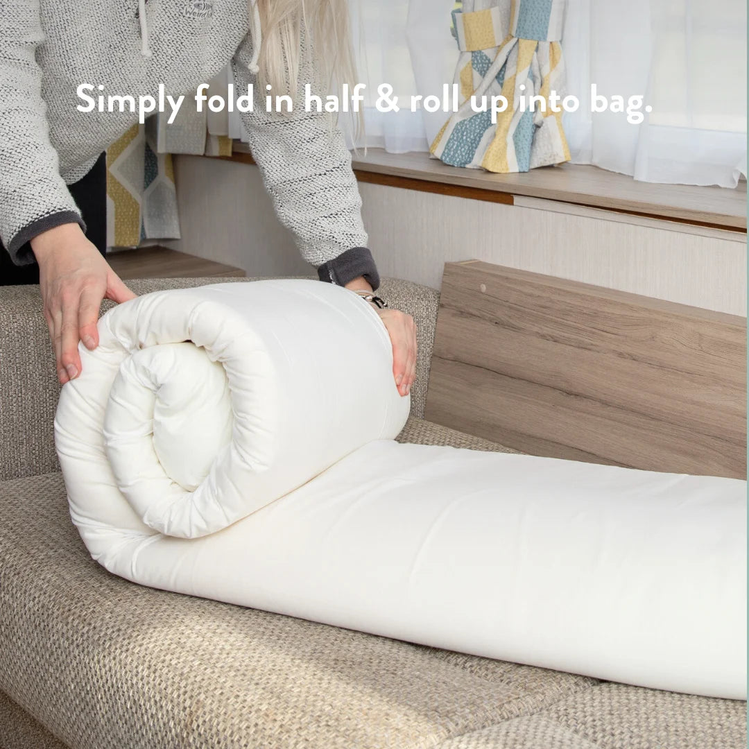 travel memory foam mattress topper in single and double with a travel bag for camping vans, motor homes, van conversions and more. Easy to roll up and put away.